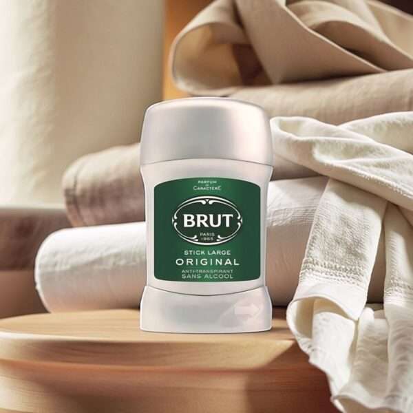 Bruit deo stick placed in modern bath with towels